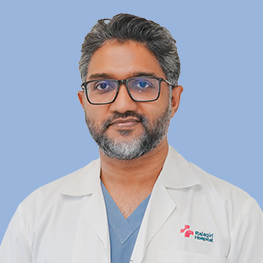 Dr. Tharun B K